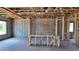 Spacious interior ready to be finished with exposed ceiling beams and wooden framing at 10652 Crescent Creek Xing, Parrish, FL 34219
