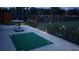 Spacious back patio with outdoor furniture, lighting, and a view of the fenced yard at 11217 Fiddlewood Dr, Riverview, FL 33579