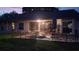 Back patio features outdoor seating, ambient lighting, and inviting atmosphere at 11217 Fiddlewood Dr, Riverview, FL 33579
