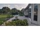Spacious backyard with patio and lush landscaping, perfect for outdoor living at 11217 Fiddlewood Dr, Riverview, FL 33579