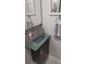 Updated bathroom features a modern vanity with stylish fixtures at 11217 Fiddlewood Dr, Riverview, FL 33579