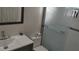 Bathroom featuring a modern vanity and a glass-enclosed shower with modern tile at 11217 Fiddlewood Dr, Riverview, FL 33579