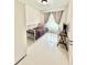 Bright bedroom with a single bed, light walls, and a view of the window at 11217 Fiddlewood Dr, Riverview, FL 33579
