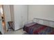 Functional bedroom featuring a single bed, closet, and neutral decor at 11217 Fiddlewood Dr, Riverview, FL 33579