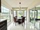 Charming breakfast nook boasts lots of natural light and views to the backyard and patio at 11217 Fiddlewood Dr, Riverview, FL 33579