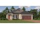 Charming one-story home with a brick driveway, attached garage, and inviting red front door at 11809 Sparkling Topaz Cv, Parrish, FL 34219