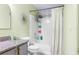 Charming bathroom featuring a shower-tub combo and vibrant accents for a delightful space at 13643 Tramore Dr, Odessa, FL 33556