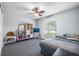 Inviting bedroom with ceiling fan, closet and neutral color palette at 13643 Tramore Dr, Odessa, FL 33556