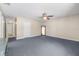 Generous bedroom with ceiling fan, closet and neutral color palette at 13643 Tramore Dr, Odessa, FL 33556