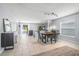 Open-concept dining area adjacent to the kitchen with tile flooring and lots of natural light at 13643 Tramore Dr, Odessa, FL 33556