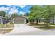 Charming single-story home with a well-manicured lawn, a two-car garage, and attractive curb appeal at 13643 Tramore Dr, Odessa, FL 33556