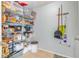 Spacious pantry with shelving for ample storage of food and household items at 13643 Tramore Dr, Odessa, FL 33556