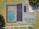 Overhead view of a house with solar panels and a screened-in pool at 13835 Pathfinder Dr, Tampa, FL 33625