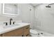 Modern bathroom features a sleek vanity, LED mirror, and glass shower at 13835 Pathfinder Dr, Tampa, FL 33625