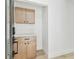 A modern entryway with updated cabinets and stylish features at 13835 Pathfinder Dr, Tampa, FL 33625