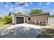 The property boasts a well-manicured lawn, a driveway, and an attached garage at 13835 Pathfinder Dr, Tampa, FL 33625