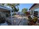 Expansive backyard showcasing a brick patio area, ideal for outdoor entertaining and relaxation at 1538 S Lake Ave, Clearwater, FL 33756
