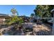 Spacious backyard features a brick patio and lush landscaping, offering a serene outdoor retreat at 1538 S Lake Ave, Clearwater, FL 33756