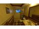 Bathroom featuring a vanity, toilet, mirror, and shower-tub combo at 1538 S Lake Ave, Clearwater, FL 33756
