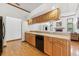 Spacious kitchen featuring quartz countertops, stainless steel appliances, and maple cabinets at 15615 Indian Queen Dr, Odessa, FL 33556