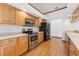Updated kitchen featuring stainless steel appliances and maple cabinets at 15615 Indian Queen Dr, Odessa, FL 33556