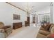 Spacious living room with comfortable seating and views into the entry and dining room at 15615 Indian Queen Dr, Odessa, FL 33556