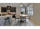 Cozy dining area adjacent to the kitchen, featuring a round table and stylish decor at 17510 Bright Wheat Dr, Lithia, FL 33547