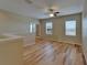 Bright loft featuring hardwood floors and a window at 17510 Bright Wheat Dr, Lithia, FL 33547