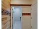 Well-organized mudroom with wood-paneled accent wall and hooks for coats at 17510 Bright Wheat Dr, Lithia, FL 33547