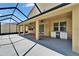 Relaxing screened patio featuring ceiling fans, an outdoor kitchen and an airy atmosphere for outdoor dining at 17510 Bright Wheat Dr, Lithia, FL 33547