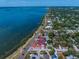 Aerial view showcasing the home's location on the waterfront with easy access to city amenities at 1963 Edgewater Dr, Clearwater, FL 33755