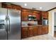 Well-equipped kitchen with stainless steel appliances, custom cabinets, and granite countertops at 1963 Edgewater Dr, Clearwater, FL 33755
