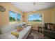 Bright living room offering water views, a comfortable sofa, and inviting decor at 1963 Edgewater Dr, Clearwater, FL 33755