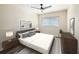Bright bedroom featuring a ceiling fan, neutral walls, and modern furnishings at 2002 Australia E Way # 66, Clearwater, FL 33763
