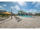 Well-maintained community pool with plenty of lounge chairs and sunny spots at 2002 Australia E Way # 66, Clearwater, FL 33763