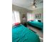 Bright bedroom featuring two beds and ceiling fan at 2100 Pass A Grille Way, St Pete Beach, FL 33706