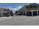 View of the street that features the 'Brass Monkey' building on a bright day at 2100 Pass A Grille Way, St Pete Beach, FL 33706