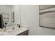 Modern bathroom showcasing a sleek vanity, ample counter space, and contemporary decor for a fresh look at 2286 Sienna Spruce St, Wesley Chapel, FL 33543