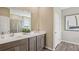 Modern bathroom with double vanity, white countertop, and stylish finishes at 2286 Sienna Spruce St, Wesley Chapel, FL 33543