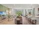 Bright open-concept living room and kitchen with seamless access to outdoor space at 2286 Sienna Spruce St, Wesley Chapel, FL 33543