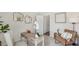 Stylish home office with vintage wooden desk and views of the backyard, creating a cozy and inspiring workspace at 2286 Sienna Spruce St, Wesley Chapel, FL 33543