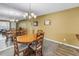 Dining room with a chandelier and large mirror to reflect light at 2452 Brazilia Dr # 18, Clearwater, FL 33763