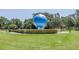 Outdoor scenic view of the unique landmark featuring a large globe on display in a park-like setting at 2452 Brazilia Dr # 18, Clearwater, FL 33763