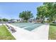 Outdoor shuffleboard courts with seating area offer recreational opportunities at 2452 Brazilia Dr # 18, Clearwater, FL 33763