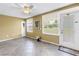 Sunroom with tile floors, lots of natural light, and access to the outside at 2452 Brazilia Dr # 18, Clearwater, FL 33763
