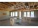 Interior of new construction home with exposed framing, windows, and concrete block walls at 3108 W Varn Ave, Tampa, FL 33611