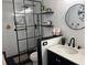 Sleek bathroom with a glass-enclosed shower, modern sink and stylish fixtures at 314 Bloomingfield Dr, Brandon, FL 33511