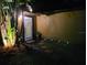 Inviting front entrance featuring a tropical garden, stepping stones, and a covered doorway providing a warm welcome at 314 Bloomingfield Dr, Brandon, FL 33511