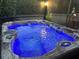 Luxurious hot tub featuring vibrant blue lighting and hydrotherapy jets for an immersive relaxation experience at 314 Bloomingfield Dr, Brandon, FL 33511