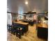 Spacious kitchen featuring black cabinets, butcher block countertops, and stainless steel appliances at 314 Bloomingfield Dr, Brandon, FL 33511